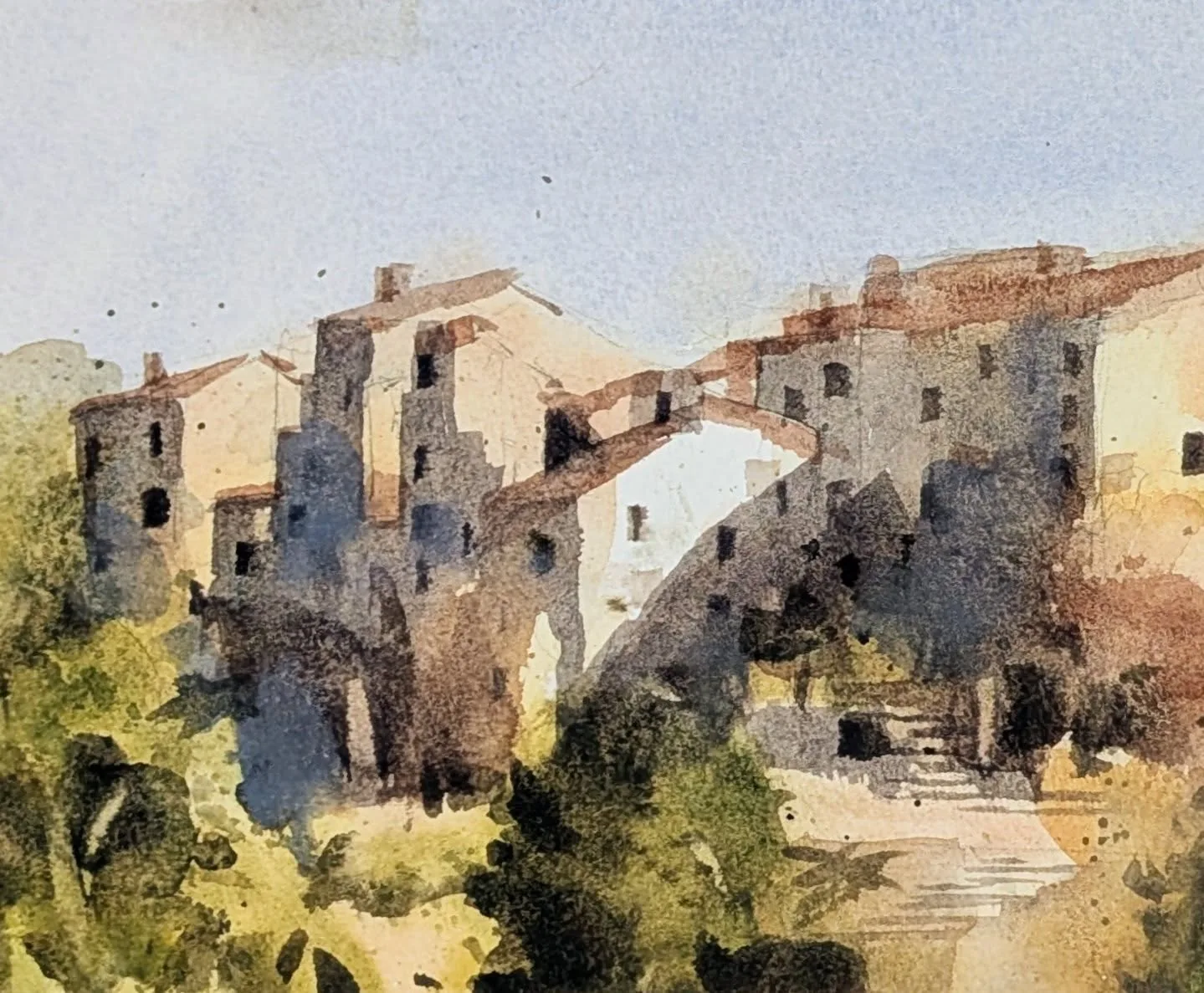 Acquerello di case e paesaggio